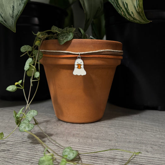 White Ghost holding a Pumpkin